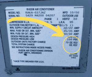 Arrow pointing to helpful info on AC unit label. 