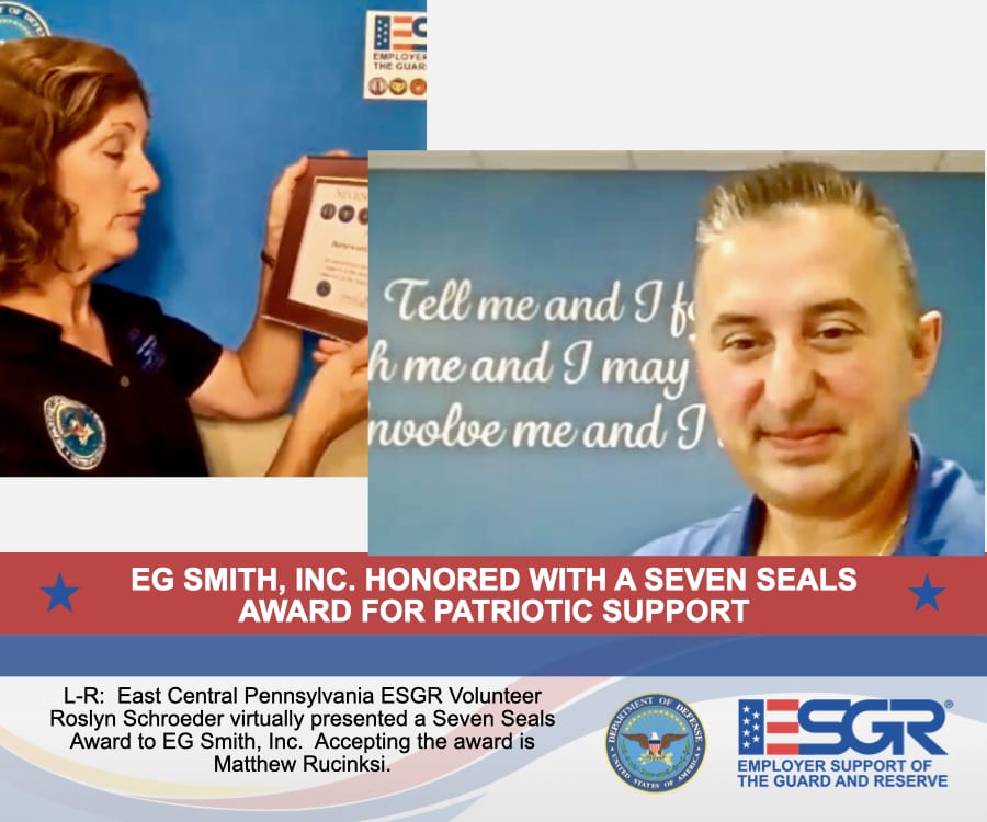 EG Smith receiving award 