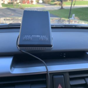 Mobile Air Scrubber on Car Dashboard