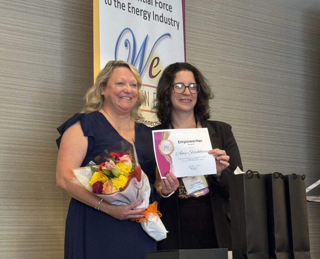 Amy Stackhouse receiving the EmpowerHER Awards from Jessica Reeder from PA Petroleum Association.